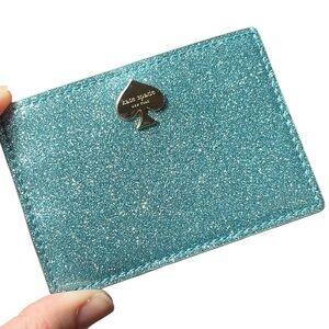 kate spade glitter teal card holder with gold spade logo